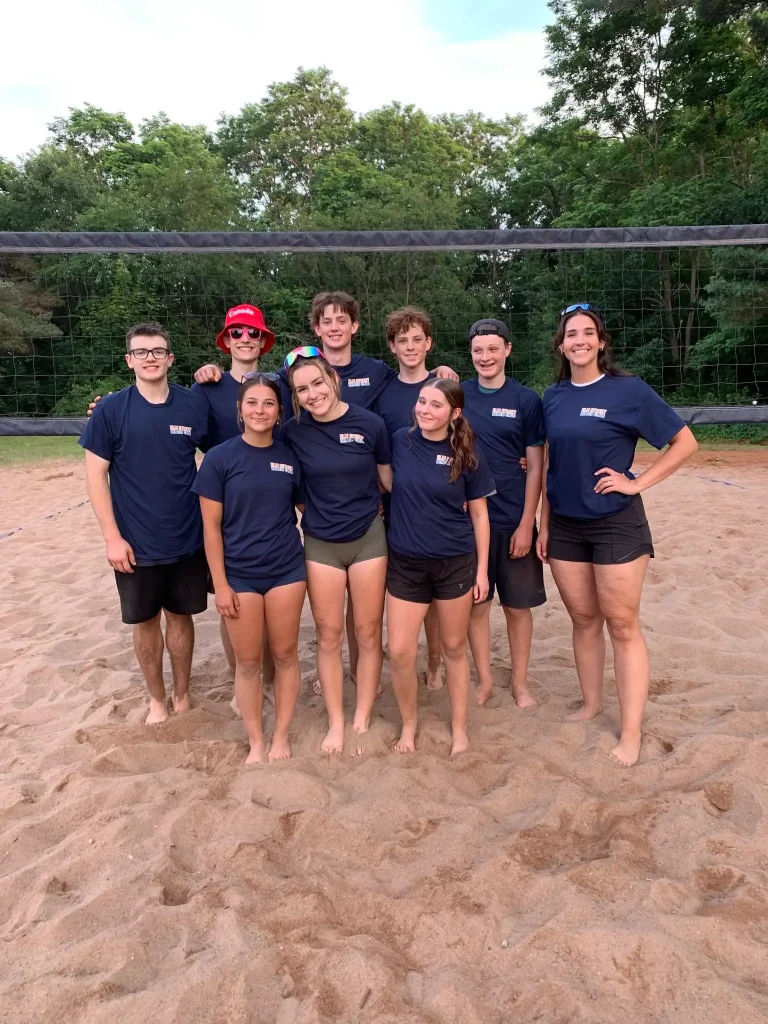 A team on the beach volleyball courts
